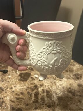 Disney Parks Mary Poppins ceramic mug with parrot handle and umbrella motif